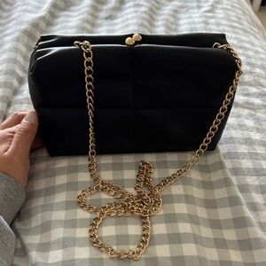 Elegant Black Quilted Bag with Gold Chain